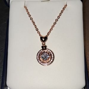 Rose Gold Necklace with Circular Pendant and Sparkling Stones